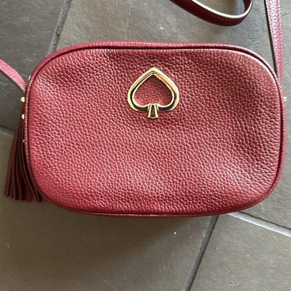 Kate Spade purse.  Used one time.  Maroon/ reddish leather.  Camera bag style. - Picture 2 of 9